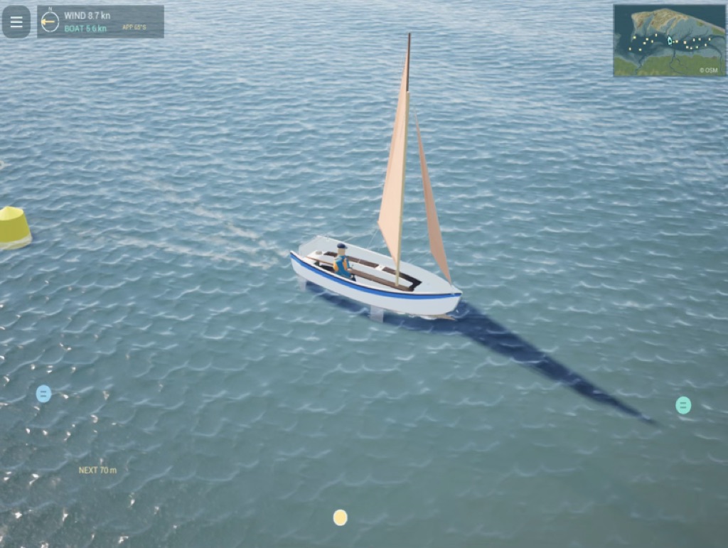 The dinghy from above, a long shadow on the water