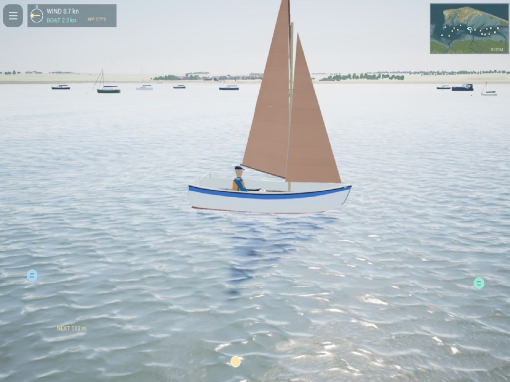 A white dinghy with a tan sail on Blakeney Harbour
