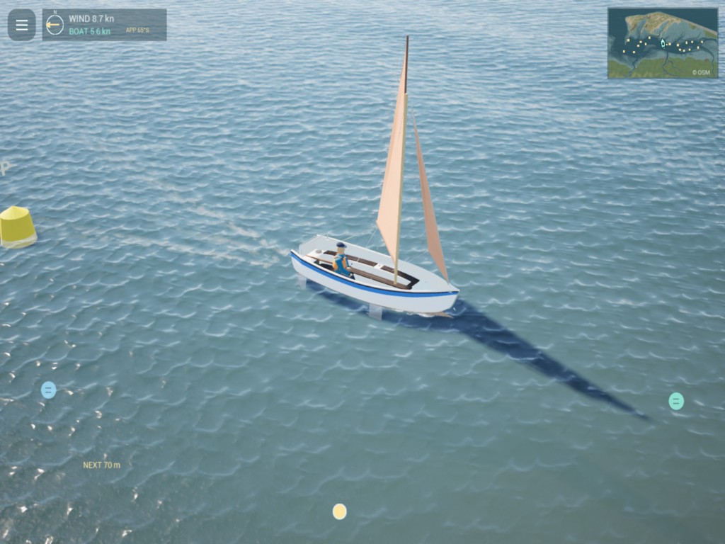 The same dinghy from above, a long shadow on the water, a yellow mark nearby